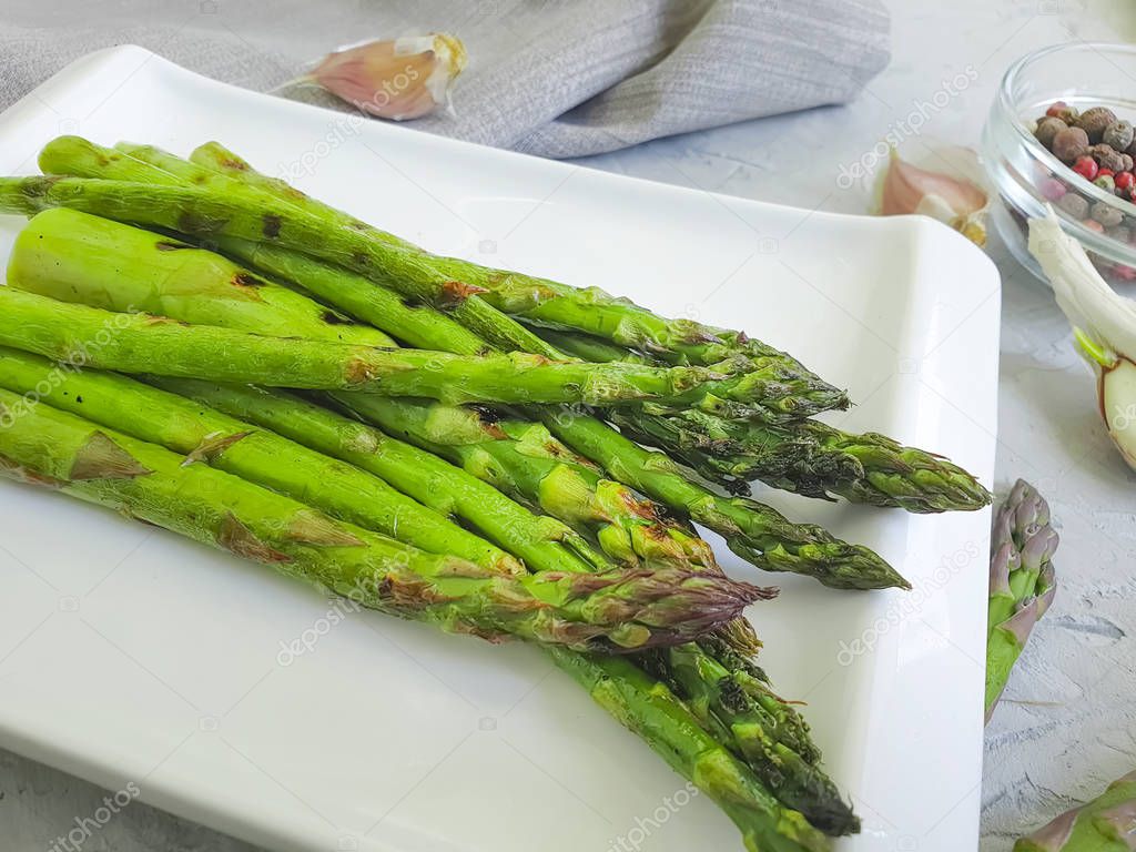 fried asparagus on concrete background