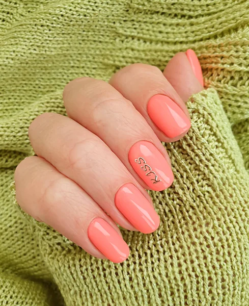 female hand nail beautiful manicure sweater