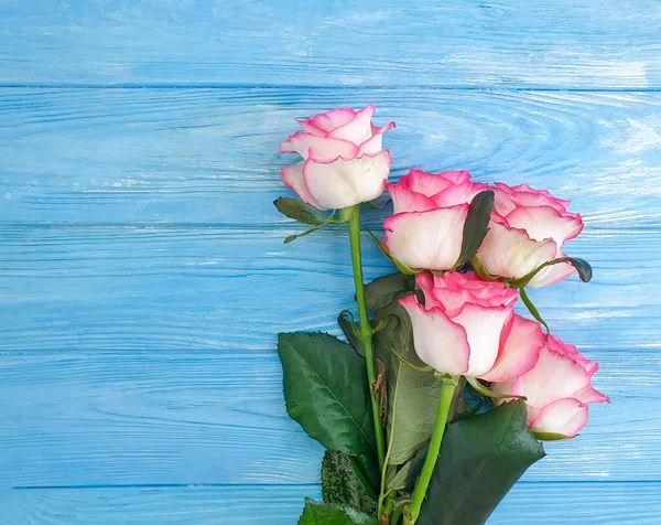 flower rose on wooden background frame