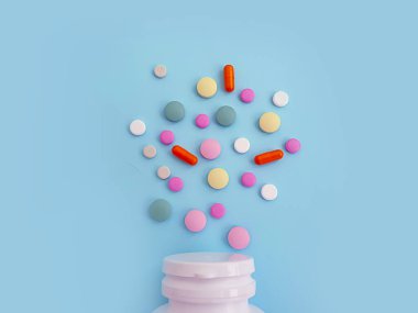 Renkli arkaplanda vitamin hapı