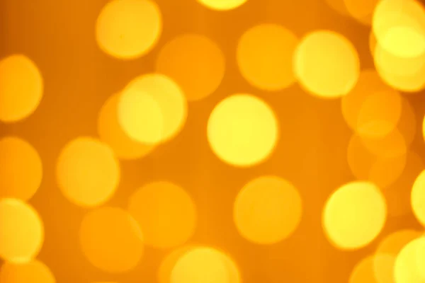 ゴールド抽象的なクリスマス背景をデフォーカスしました 金色と黄色の円の背景 — ストック写真