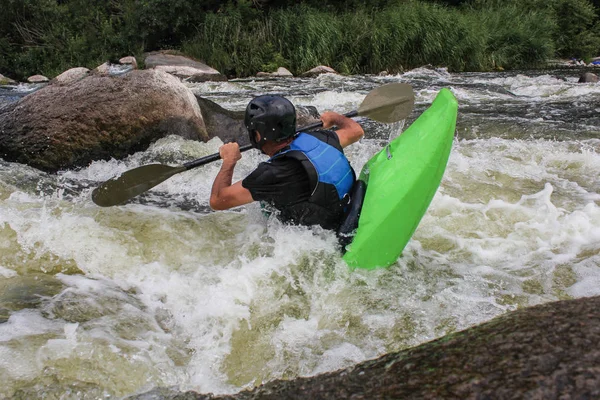 River Kayaking as extreme and fun sport. Life in motion. Outdoor sports.