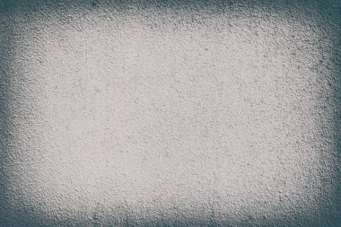 Beyaz ve gri renkli tek renkli dokular. Grunge eski duvar dokusu, beton arka plan. Arka planlar için desenli Venedik sıva kaplaması. Vignet etkisi