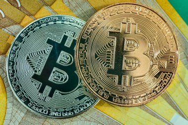 Bitcoins euro euro için bitcoins için. Altın Bitcoin yakın çekim. Cryptocurrency. Euro banknot arka plan