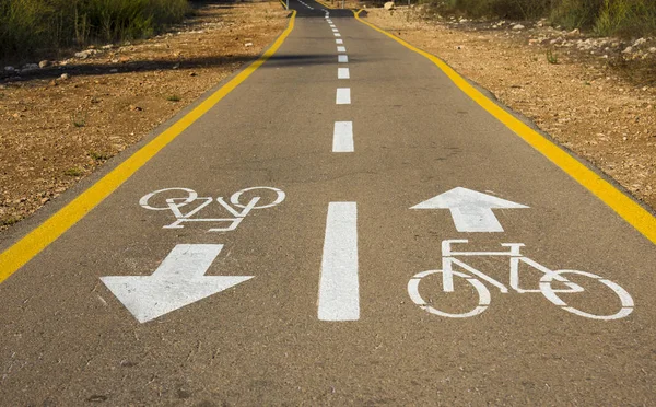 Bicycle sign on the road used for pedestrian crossing bicycle lane