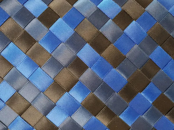 cubed satin ribbons of blue brown blue weaving ribbons