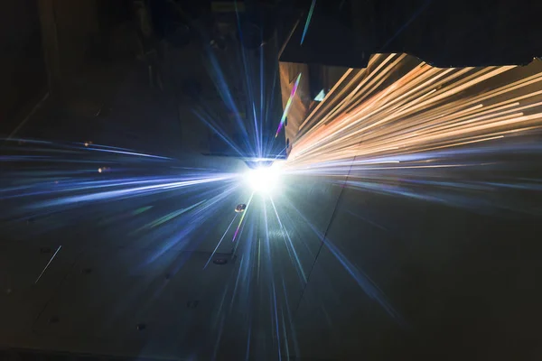 Industrial Laser cutting processing manufacture technology of flat sheet metal steel material with sparks