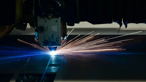 Industrial Laser cutting processing manufacture technology of flat sheet metal steel material with sparks