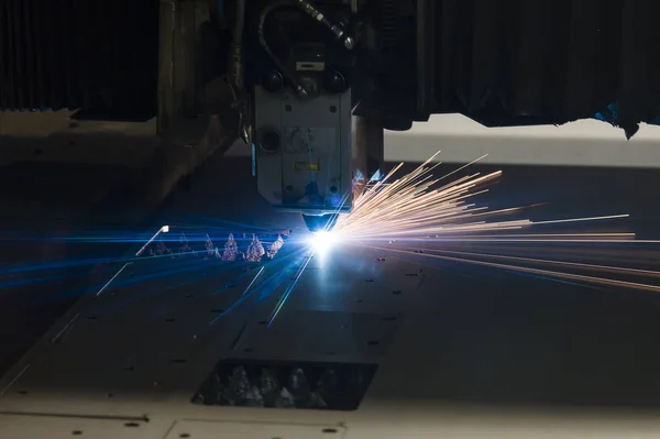 Industrial Laser cutting processing manufacture technology of flat sheet metal steel material with sparks