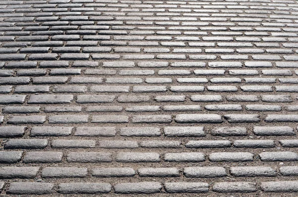 a smooth paving stone, road paving stones, cobblestones