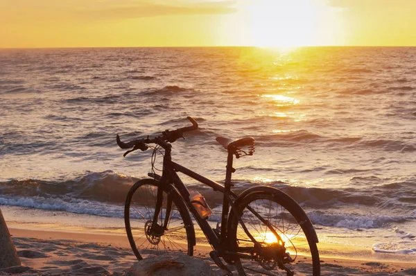 black bike by the sea, bike and sunset by the sea