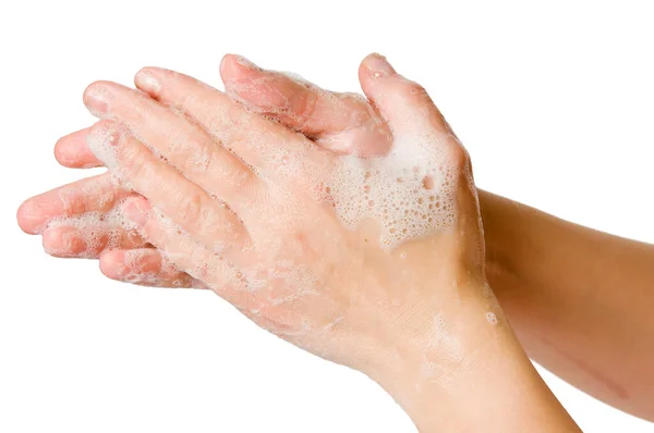 白い背景を持つ石鹸に泡の手で側面の閉鎖 ロイヤリティフリーのストック画像