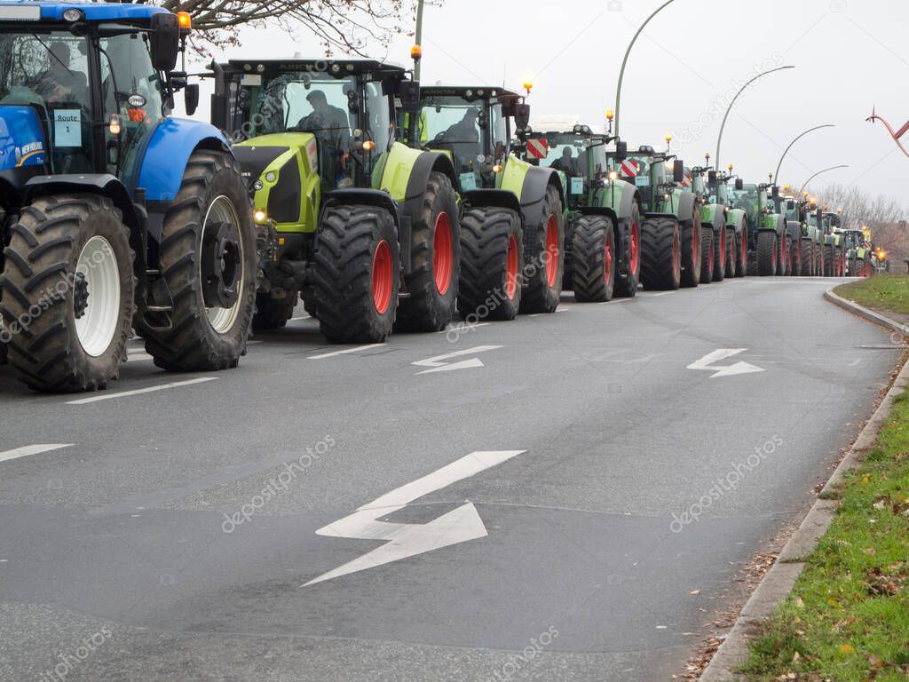 Tractors in a row block an access road to Berlin in protest for a fairer policy for agriculture in Germany.