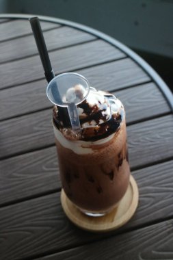 chocolate milkshake with ice cream and chocolate in a glass