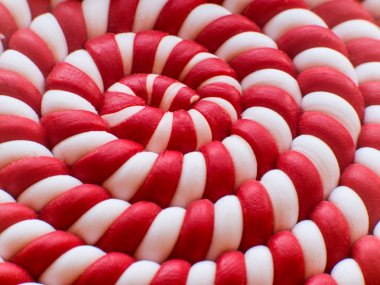 Beyaz ve kırmızı sarmal lolipop arka plan closeup. Sarmal arka plan.