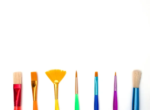 Various Colorful Paint Brushes White Background Flat Lay Top View — Stock Photo, Image