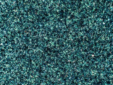 Arka plan payet. arka plan pullu. parlak yüzey aktif. Yanıp sönen ışıklar ile tatil soyut glitter arka plan. Kumaş pullu parlak renkler. Moda kumaş glitter, pullu. Defocused.