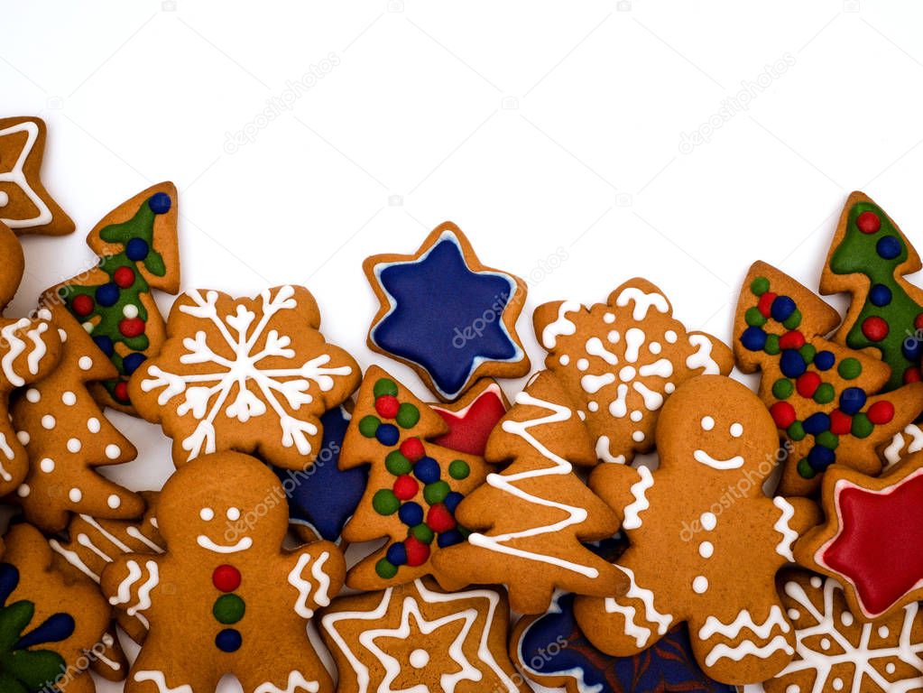 Happy New Year and Merry Christmas gingerbread on white background. Christmas baking. Making gingerbread christmas cookies. Christmas concept.