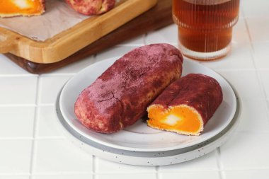 Goguma Ppang Korean sweet potato bread dessert with golden crust.