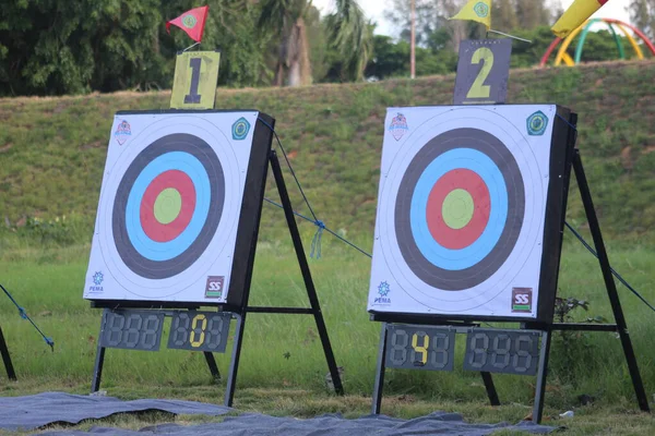 Banda Aceh, Indonesia - September 18, 2025: Two professional archery targets set up outdoors on a grassy field