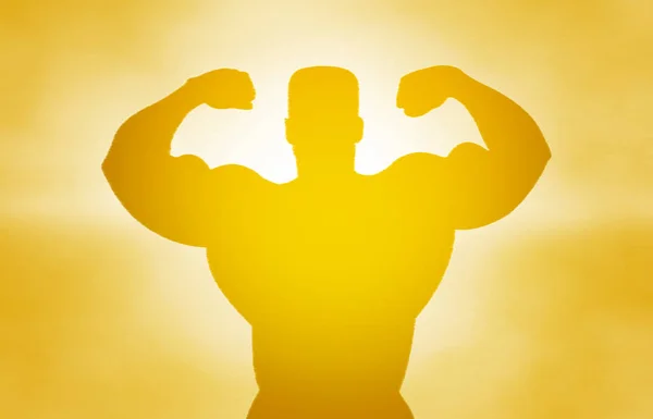 Icon of bodybuilding.Silhouette bodybuilding icon on yellow background in sunlight from sports collection. Healthy body. The spirit of a champion. Energy, muscle, victory, success