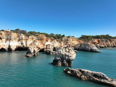 Cliffs of the Algarve between Portimao and Alvor, beautiful bays and beaches on the Atlantic Ocean
