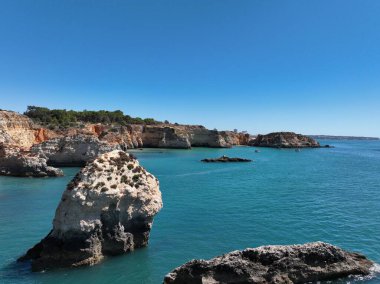 Cliffs of the Algarve between Portimao and Alvor, beautiful bays and beaches on the Atlantic Ocean