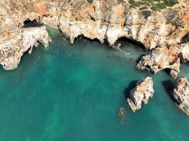 Cliffs of the Algarve between Portimao and Alvor, beautiful bays and beaches on the Atlantic Ocean