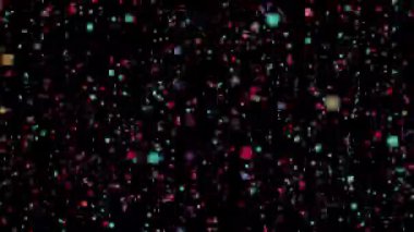 Renkli kürelerin soyut animasyonu koyu bir arkaplan üzerinde yüzüyor ve parıldıyor