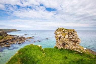 Findlater Castle ruins near the village Cullen clipart