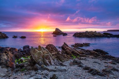 Sunrise at Cullen Bay near Portknockie and Bow fiddle Rock clipart