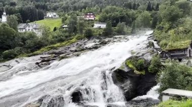 Waterfall in the village of Hellesyt Norway.mp4