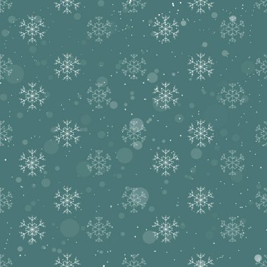 Yeşil zemin üzerinde beyaz kar taneleri olan noel geometrik kusursuz desen.