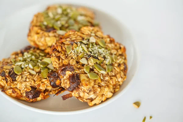 Vegan Oatmeal Cookies Dates Pumpkin Seeds White Plate Healthy Vegan — Stock Photo, Image