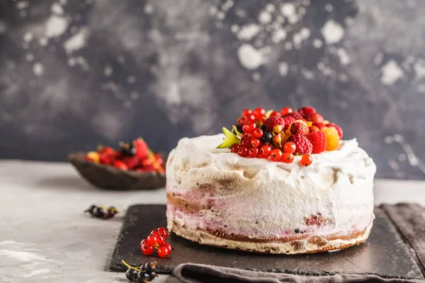 Healthy vegan cake with coconut cream and berries. Healthy vegan food (dessert) concept.