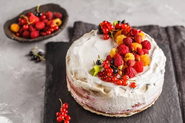Healthy vegan cake with coconut cream and berries. Healthy vegan food (dessert) concept.