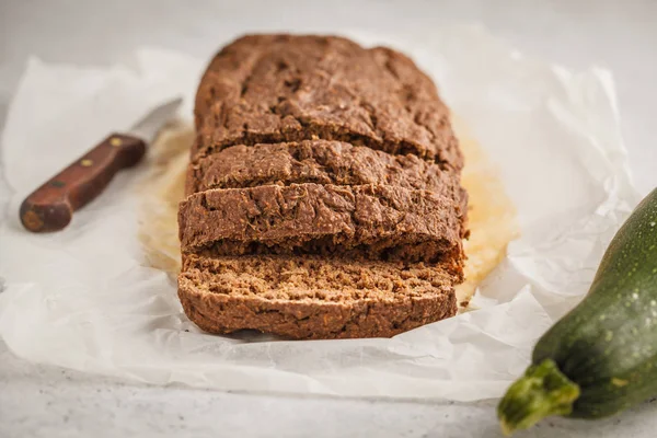 Chocolate vegan zucchini bread, white background. Clean eating concept.