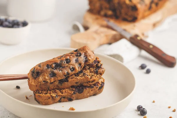 Vegan blueberry bread (cake). White background, healthy vegan dessert.