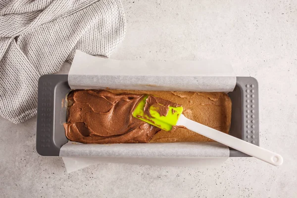 The process of preparing raw vegan cake, cashew cake on a white background.