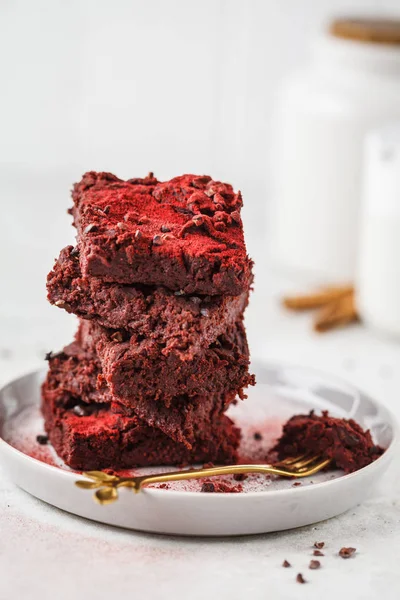 Beet brownie on gray plate. Healthy vegan food concept.