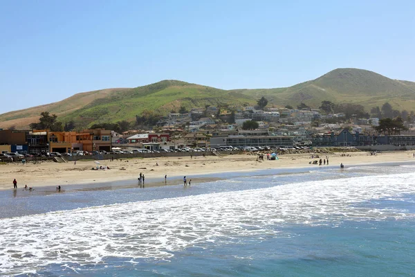 Cayucos, California, USA July 1, 2025 A Peaceful Small Coastal Town in San Luis Obispo County on a Sunny Day with Ocean Waves, Sandy Beach, Pier Next to the Pacific Ocean Near Morro Bay, Cambria, CA