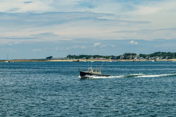 Fishing boat and Beautiful landscape of ocean beach Cape cod Massachusetts US