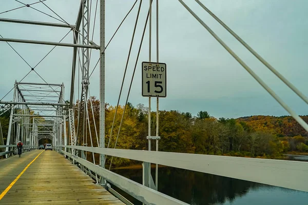 Dingmans Ferry Bridge across the Delaware River in the Poconos Mountains, connecting the states of Pennsylvania and New Jersey, USA