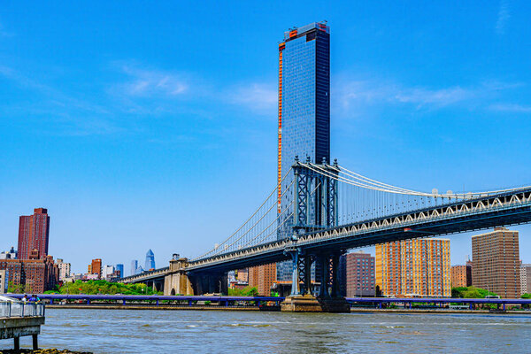 Manhattan Bridge over East River and waterfront condominium Manhattan New York City US