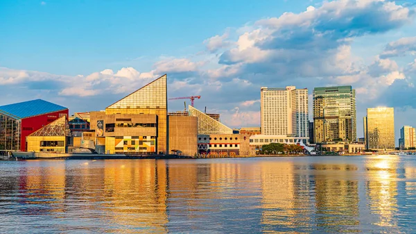 Baltimore, Maryland, US - September 4, 2019 View of Baltimore Harbor with USCG Lightship Chesapeake, Submarine USS Torsk and office buildings.