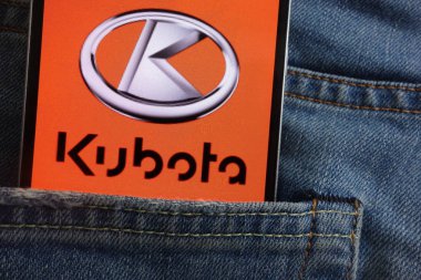 KONSKIE, POLAND - JUNE 01, 2018: Kubota logo displayed on smartphone hidden in jeans pocket clipart