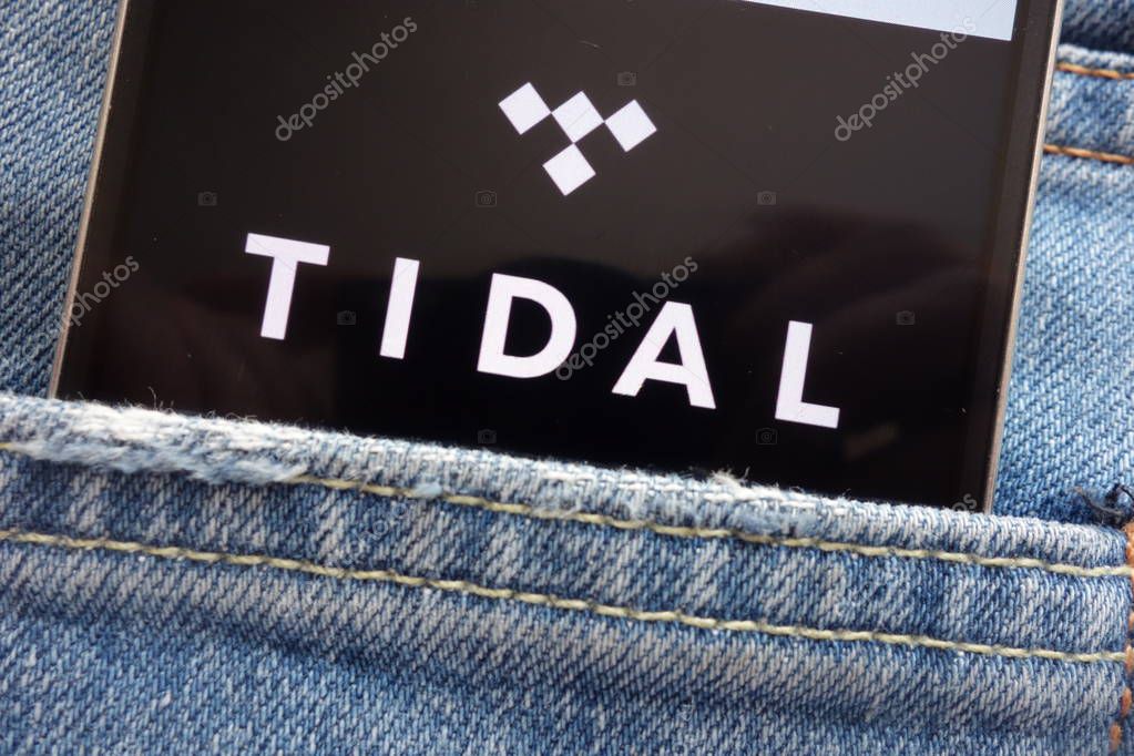 KONSKIE, POLAND - JUNE 02, 2018: Tidal logo displayed on smartphone hidden in jeans pocket