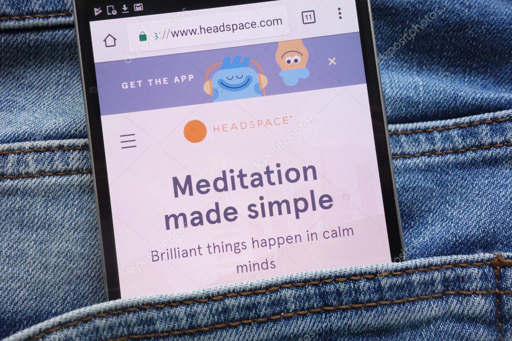 KONSKIE, POLAND - JUNE 09, 2018: Headspace website displayed on smartphone hidden in jeans pocket