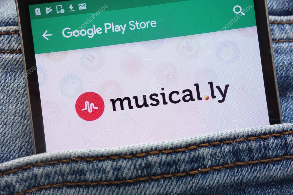 KONSKIE, POLAND - JUNE 09, 2018: Musical.ly app on Google Play Store website displayed on smartphone hidden in jeans pocket