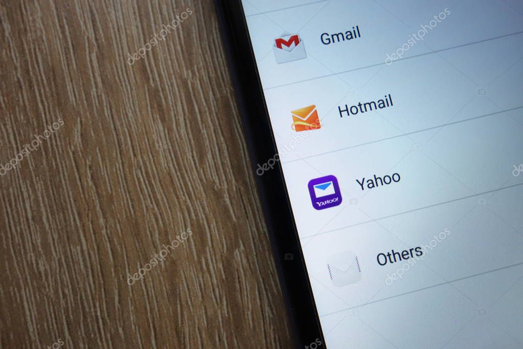 KONSKIE, POLAND - JUNE 17, 2018: Popular email service providers including Gmail, Yahoo and Hotmail, displayed on a new modern smartphone